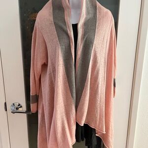 100% linen light cardigan with handkerchief hem in gray and light pink.
